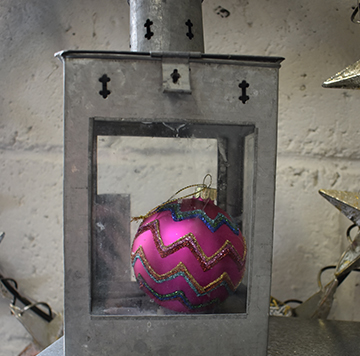 dark pink chevron bauble in a zinc lantern