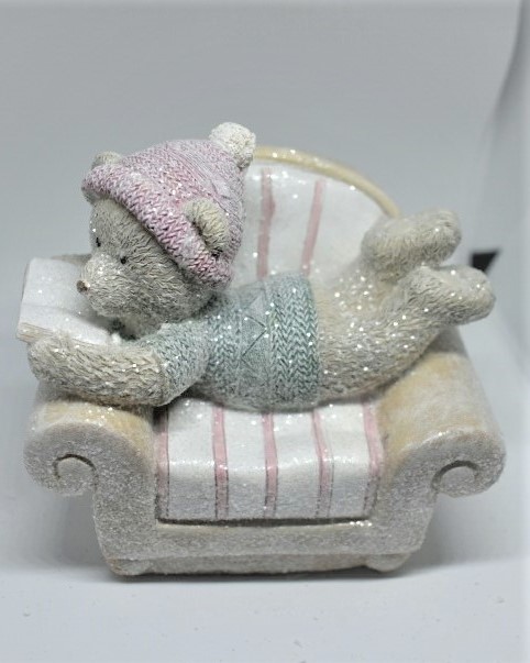 bear on an armchair reading - moneybox