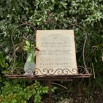 vintage sheet music on a vintage style music stand