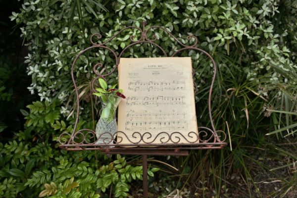 vintage sheet music on a vintage style music stand