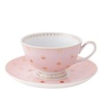 pink and gold polka dot cup and saucer