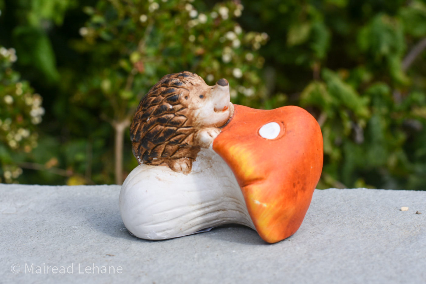 hedgehog ornament with head on mushroom top